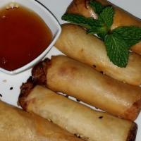 Crispy Spring Rolls · Deep-fried mixed vegetables roll with plum sauce.