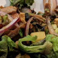 Duck Salad · Hot and spicy. Sliced roasted duck with romaine lettuce, tomatoes, pineapples and cashew nut...