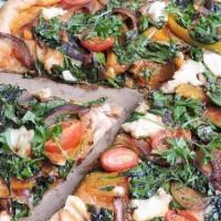Veggie Pizza · Mushrooms, green peppers, onions, olives and spinach.
