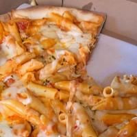 Penne Vodka Pizza · Prosciutto in a flamed vodka, tossed in pink sauce with penne pasta.