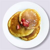 Classic Pancakes · Three fluffy house pancakes cooked with care and love.