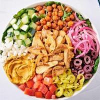Grilled Chicken Bowl · Hummus, Feta cheese, Crispy harissa chickpeas, Olives, Banana peppers, Mixed greens, Tomato,...