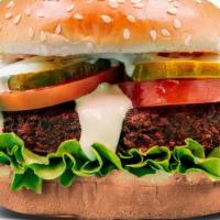 Falafel Burger · 1/4 lb patty, Tzatziki Sauce, leaf lettuce, shaved onions, and tomato.