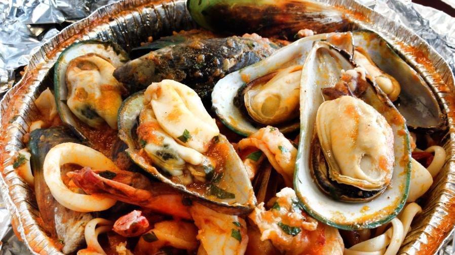 Seafood Alla Rays · Shrimp, mussels, calamari, and light garlic with marinara sauce.
