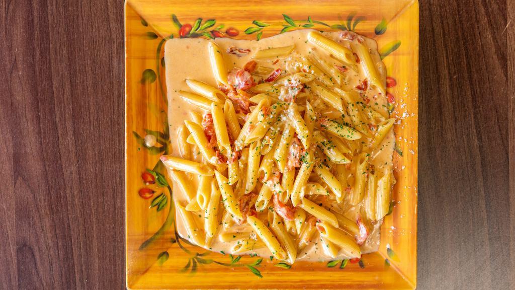 Penne Alla Vodka · Served with homemade bread.