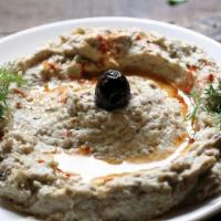 Baba Ghanoush · Grilled eggplant mixed with tahini, mayo, garlic and olive oil.