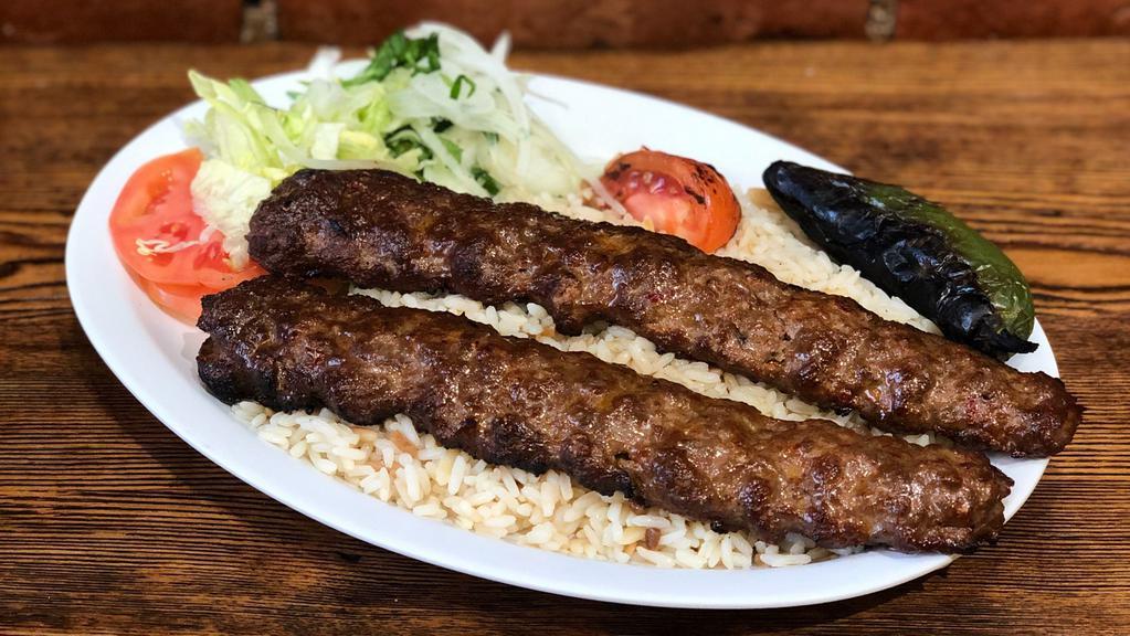 Lamb Adana Kebab · Ground lamb flavored with red bell peppers slightly seasoned with paprika and grilled deliciously on skewers