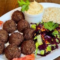 Dinner Falafel Plate (7Pcs) · Chickpeas mashed with onions, parsley, garlic and deep-fried served with hummus, rice and sa...