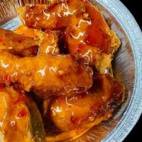 Thai Chicken Wings · Glazed with sweet chili sauce.
