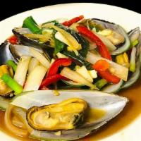 Mussel Bowl · Steam mussel in rice wine broth, onion, red pepper, scallion, thai basil.
