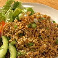 Lucky Chicken · Spicy. Minced chicken, Chiang Mai spice, rice powder, shallots, scallion, cilantro, mint, fr...