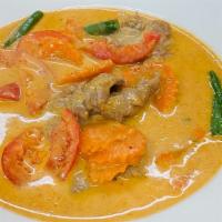 Panaeng Curry · Spicy. Carrot. String bean, coconut milk with panaeng curry paste.