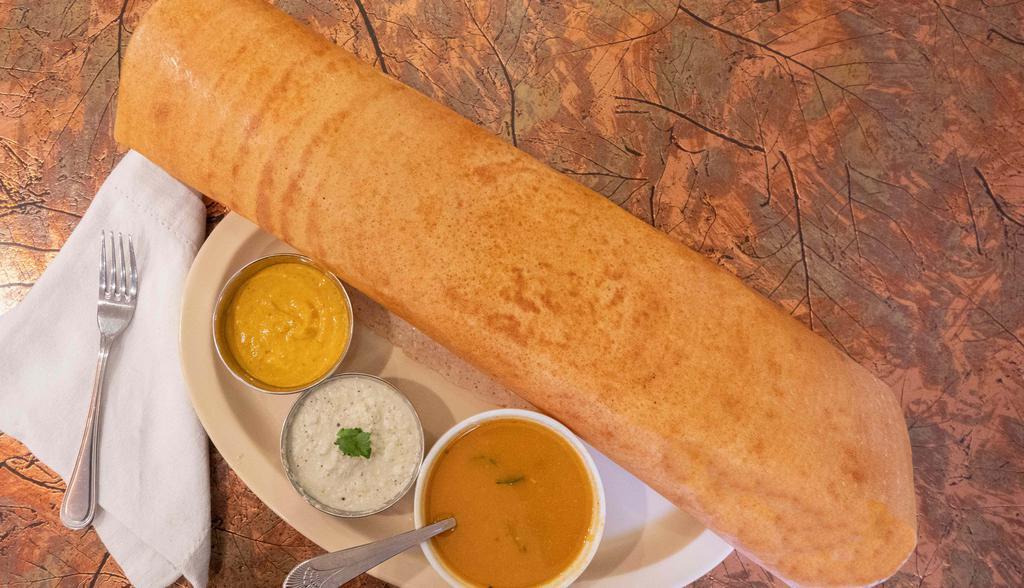 Paper Masala Dosa · Long, thin crispy crepe filled with potatoes and onions.