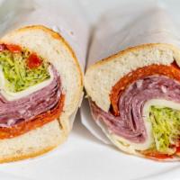 Italian Combo Sandwich · Genoa Salami, Cappy ham, pepperoni, provolone cheese, lettuce, tomatoes, onions, roasted pep...