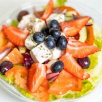 Greek Salad · Romaine Lettuce, Feta Cheese, Black olives, Tomato, Red Onion & Oregano.