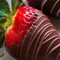 Fresh Dozen Of Belgian Chocolate Covered Strawberries · These treats perfectly combine fresh, juicy strawberries, and rich chocolate. The final prod...