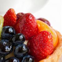 Fresh X-Large New Organic Fruit Tart · This delicious tart will also win over all those who taste it. Made with pastry filing and t...