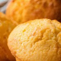 Fresh Handmade X-Large Corn Muffin · Moist and delicious, these luscious cornbread muffins made with a hint of mouth-watering hon...