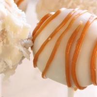 Handmade Caramel Cake Pop · Caramel cheesecake flavored cake pops dipped in white chocolate and topped with homemade car...