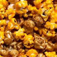 Fresh Chicago Mix Popcorn · Our delicious caramel and cheddar flavored popcorn in a bucket just for you!