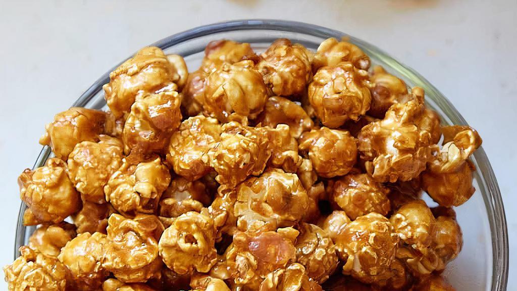 Caramel Popcorn · Caramel corn or caramel popcorn is a confection made of popcorn coated with a sugar or molasses based caramel. It’s the best crispy caramel corn you can ever try. It's like a Cracker Jack of course way better.