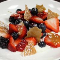 Seasonal Fresh Berries · Whipped Vanilla Cream, Crisp Honey Brittle