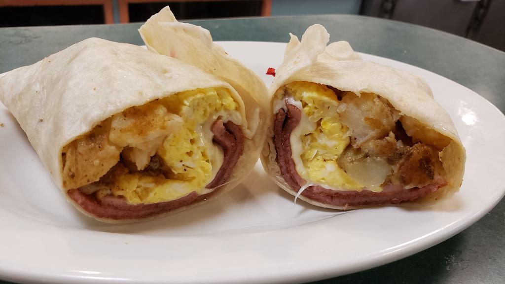 Campus Breakfast Wrap · Two eggs, choice of meat, choice of potato and cheese in a wrap.