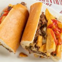 Cheese Steak Hot Sandwich With The Works · Peppers, onions, potatoes, and ketchup.