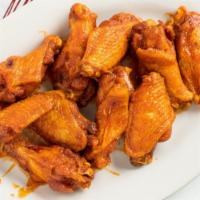 Chicken Wings (10 Pcs.) · Your choice of sauce and dip.