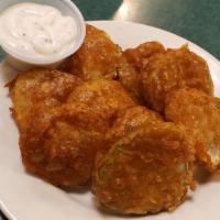 Homemade Fried Pickles · Served with a side of ranch dressing.