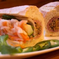 Classic · Pate, Vietnamese ham, and roasted ground pork. Served with mayonnaise, butter, cucumber, jul...