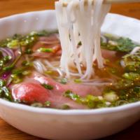 Beef Broth Pho · Served with bean sprouts, basil, cilantro, scallion, red onion, and your choice of protein. ...