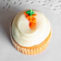 Carrot Cake · A classic carrot cake cupcake topped with a cream cheese frosting and finished with a frosti...