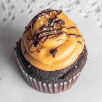 Salted Caramel · Chocolate cupcake topped with salted caramel buttercream and rolled in toffee crunch.