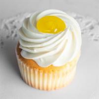 Lemon Burst · Vanilla cupcake, filled with a light lemon curd custard and topped with vanilla buttercream.