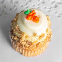 Carrot Cake With Nuts · Classic carrot cake topped with a cream cheese frosting rolled in nuts and finished with a f...