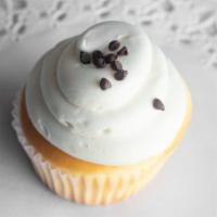 Gluten-Free Vanilla · Gluten-free vanilla cupcake topped with vanilla buttercream and topped with mini chocolate c...