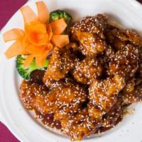 Sesame Chicken · Boneless breaded chicken, sprinkled with sesame seeds with our chef's special sauce.