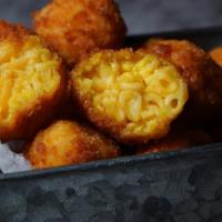 Mac N' Cheese Bites · Baked bite size macaroni pasta in a cheese sauce.