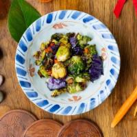 Peppercorn Brussel Sprouts · With Sichuan Peppercorn