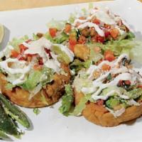Sopes · 3 tortillas baskets deep-fried. Topped with beans, Your meat of choice, lettuce, Pico de Gal...