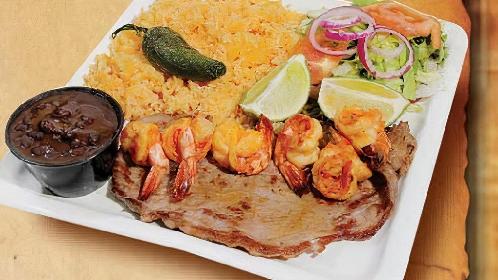 Grilled Steak With Shrimp · Served with rice, beans, green salad and grilled jalapeño.