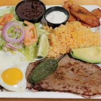 Steak & Egg · Served with rice, beans, salad, avocado, 2 over easy eggs, sweet plantains & cream.