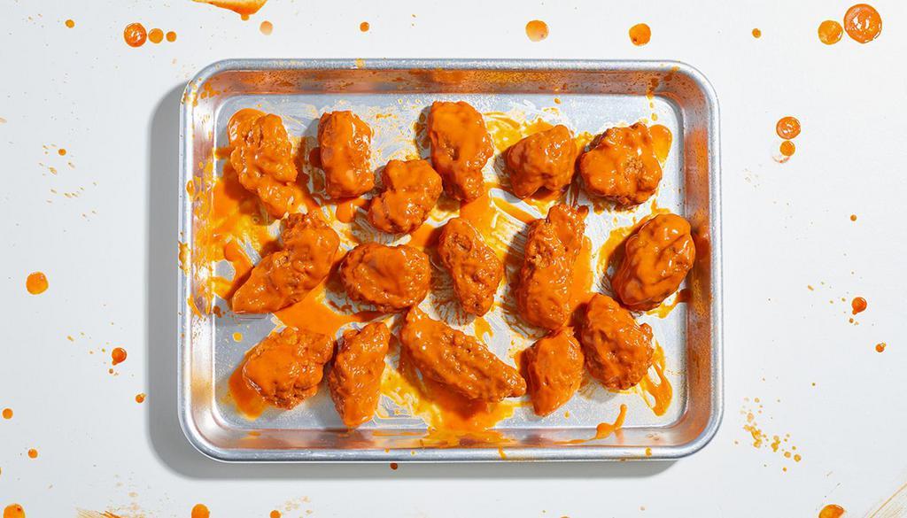 Boneless Chicken Wings (16) · 16 boneless wings with your choice of sauce. Served with celery or carrots, and blue cheese or ranch.