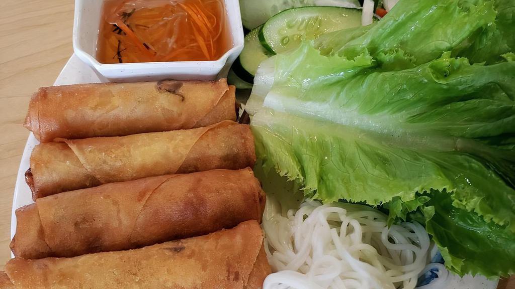 Crispy Spring Rolls / Chả Gio · Highly Recommended Four pieces. Ground pork, long rice, carrots, onions, mushroom wrapped in rice paper, deep-fried until golden brown. Served with house nước mắm.