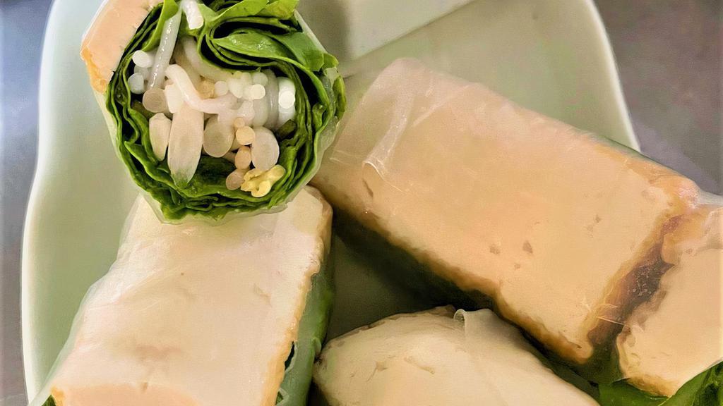 Vegan Rolls / Gỏi Cuốn Chay · Tofu, fresh mint, lettuce, cilantro, bean sprout and vermicelli rice noodles rolled in rice paper. Served with house peanut sauce.