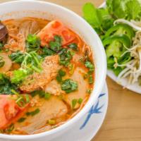Crab Noodle Soup / Bún Riêu Cua · Bún Riêu Cua |  Pork-based broth - pork, fish cake tofu, tomato and crab meat. Served with v...