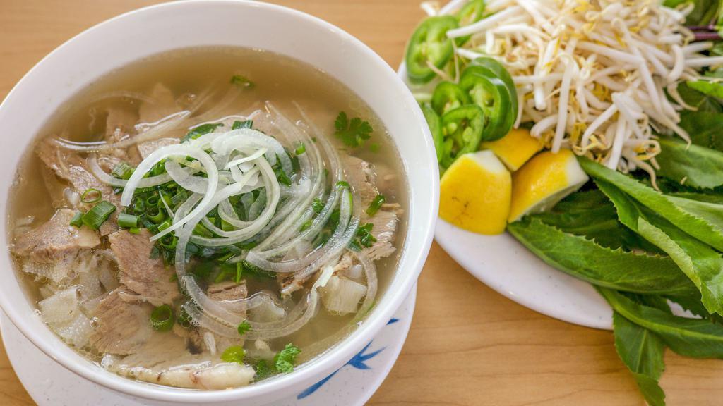Da Pho Special- 2 Choices Of Meat · Fresh rice noodles served with a side of bean sprouts, basil leaves, lime, jalapenos, onion, and cilantro, beef broth made daily. Our broth is made from beef bones, ginger, onions, and aromatic spices.