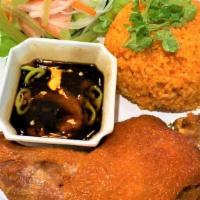 Cơm Gà Xối Mỡ - Fried Chicken With Fried Rice · Cơm Gà Xối Mỡ | Deep fried chicken thigh served with fried rice, salads, tomatoes, cucumber,...