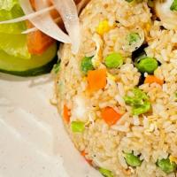 Fried Rice · Grained rice, mixture of warm peas, carrots and green onions. (hot soup on the side)